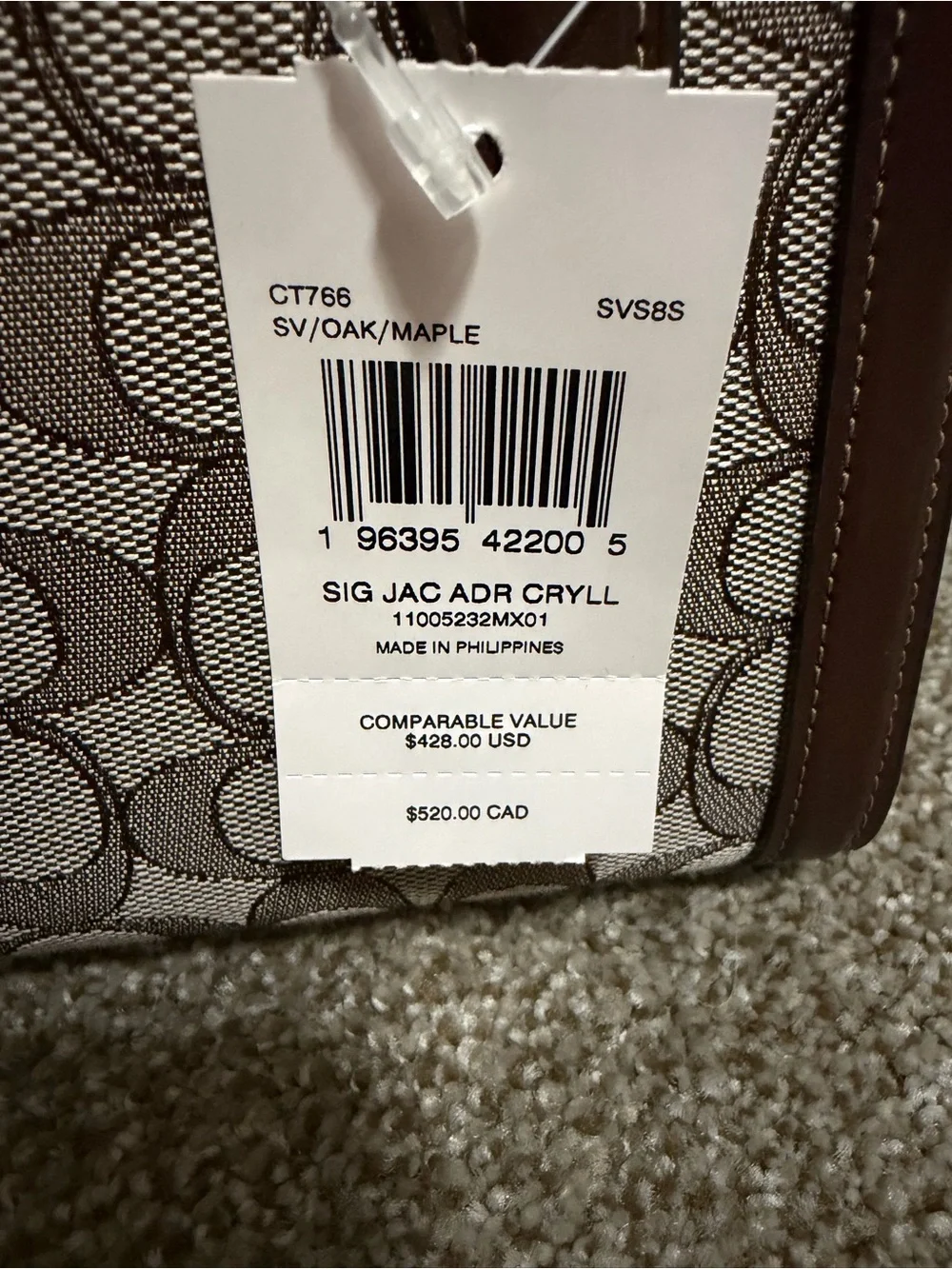 Coach Signature purse with Brown Leather Trim